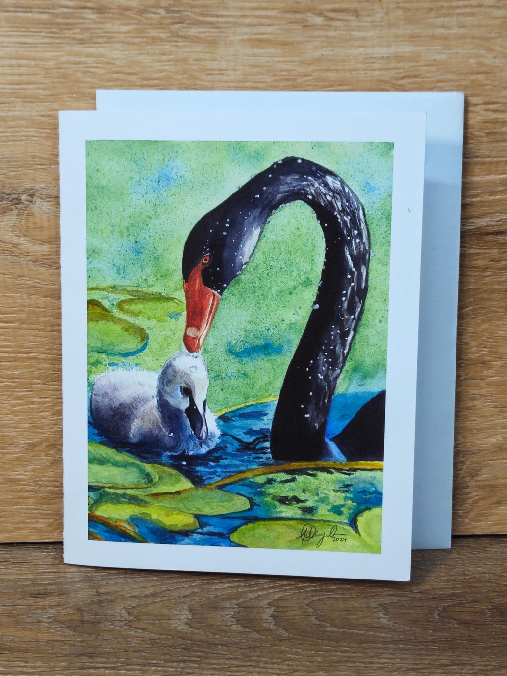 Black Swan with Gosling Greeting Card
